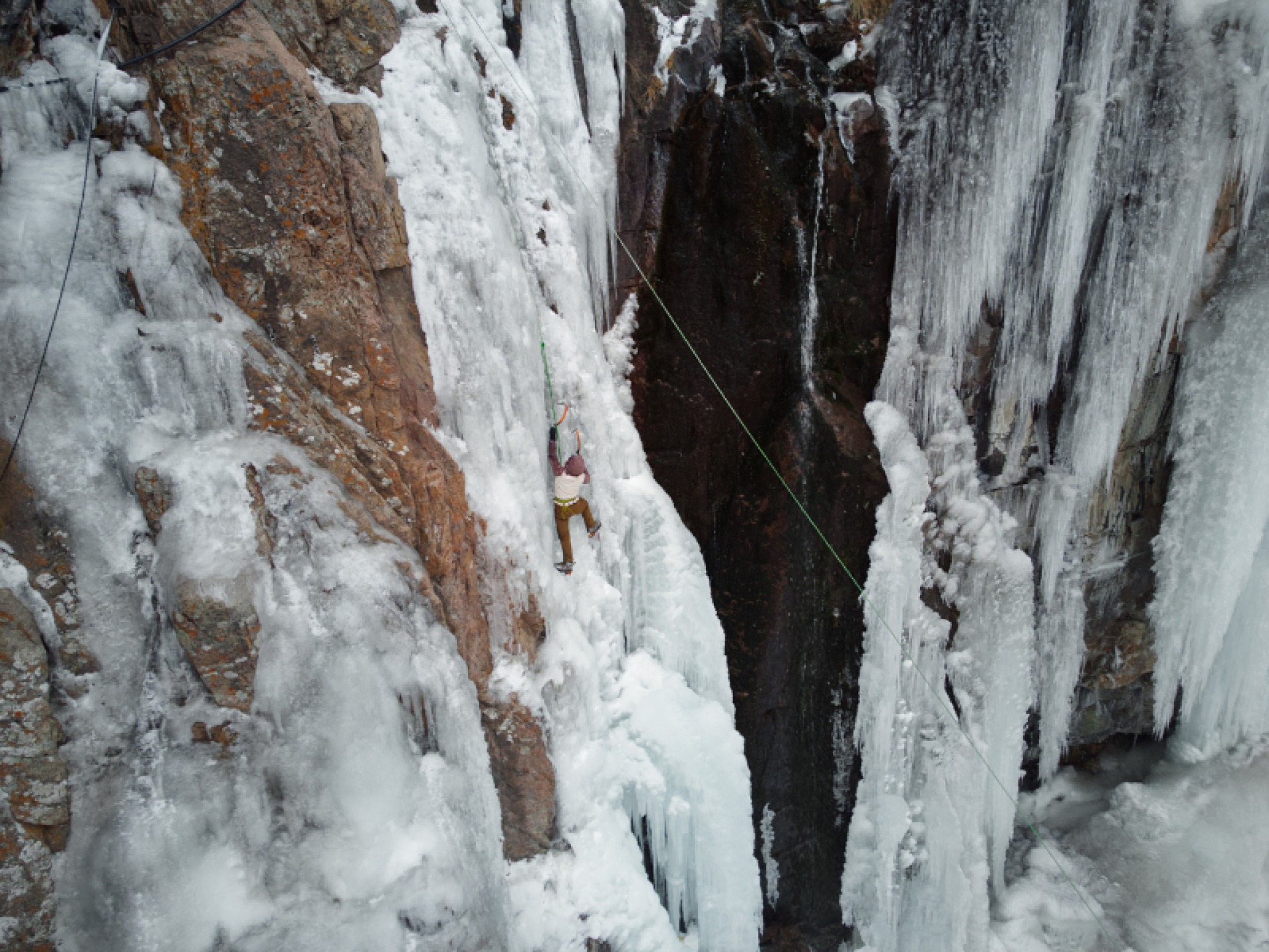 Climbing on frozen waterfall