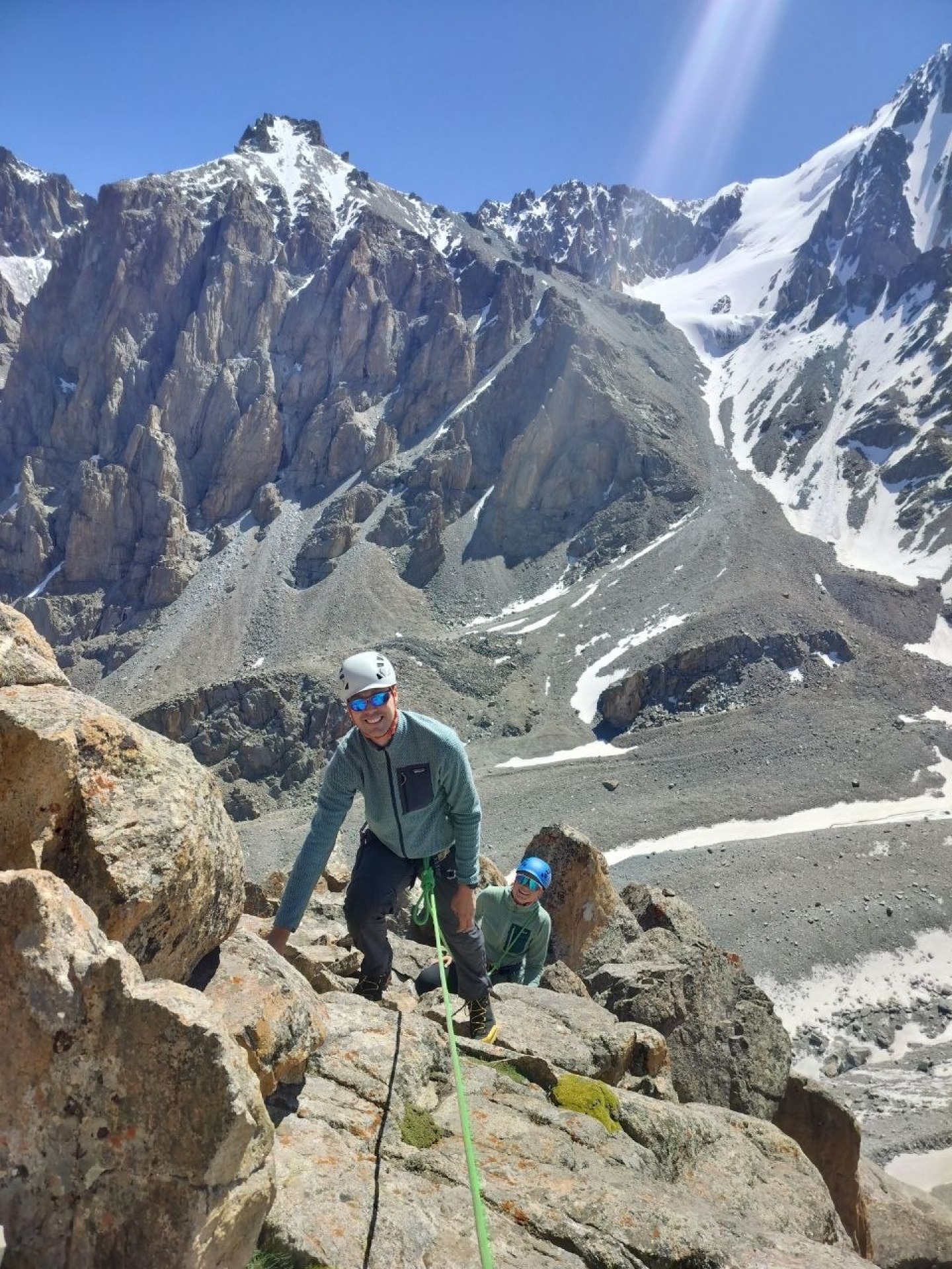 Silk Road Guiding clients climbing Ratsek peak